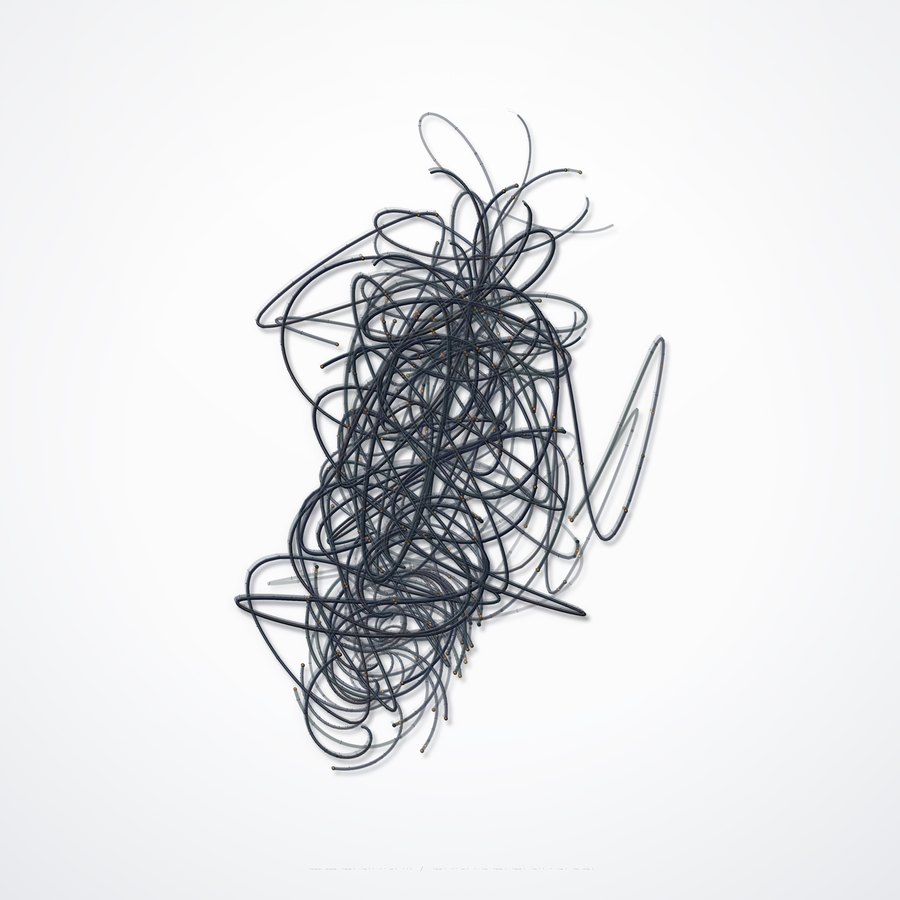 Dark Geometry: an engraved gunmetal tangle.